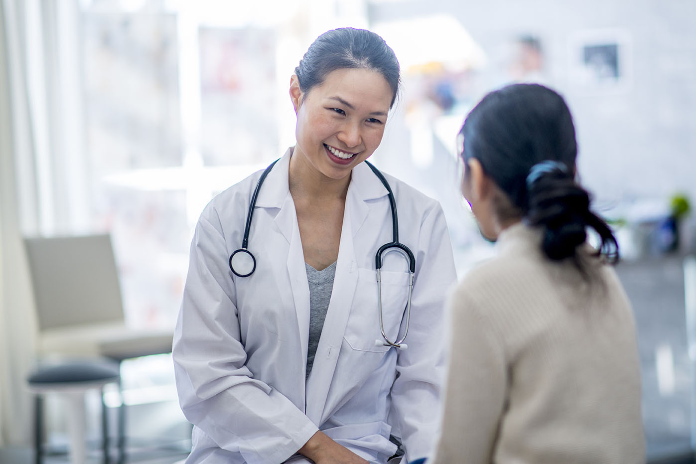 Doctor smiling at a patient